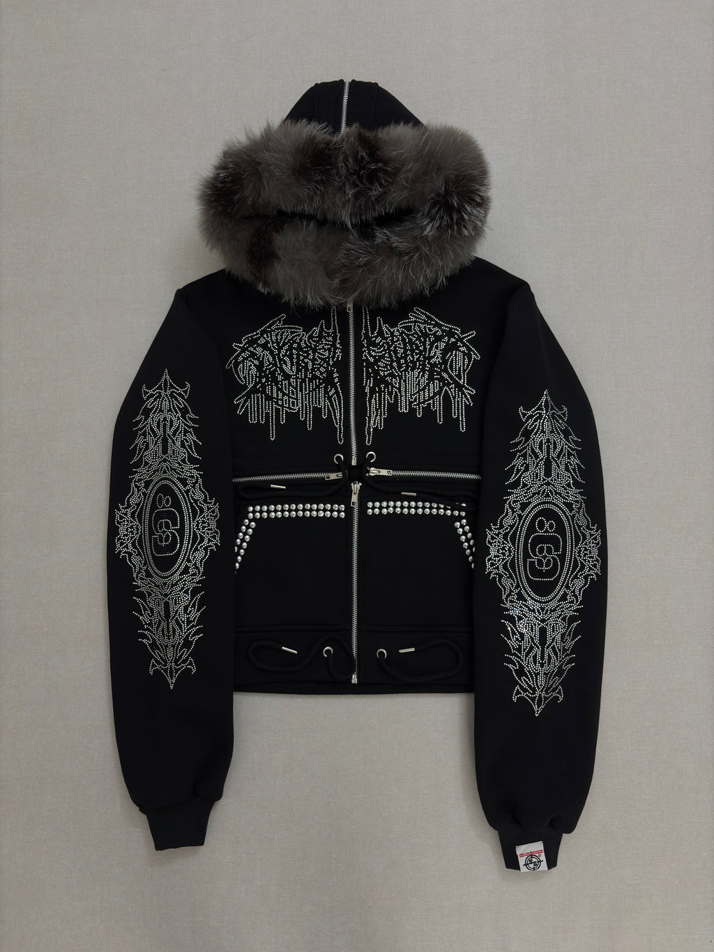 TRIBAL SYMBOL CROSS-ZIPPER