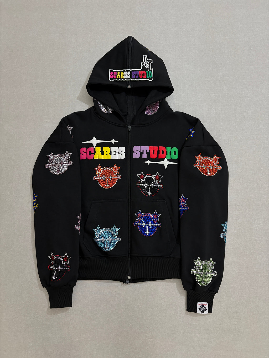 BLACK MULTI-COLOUR CARTOON STARS ZIPPER