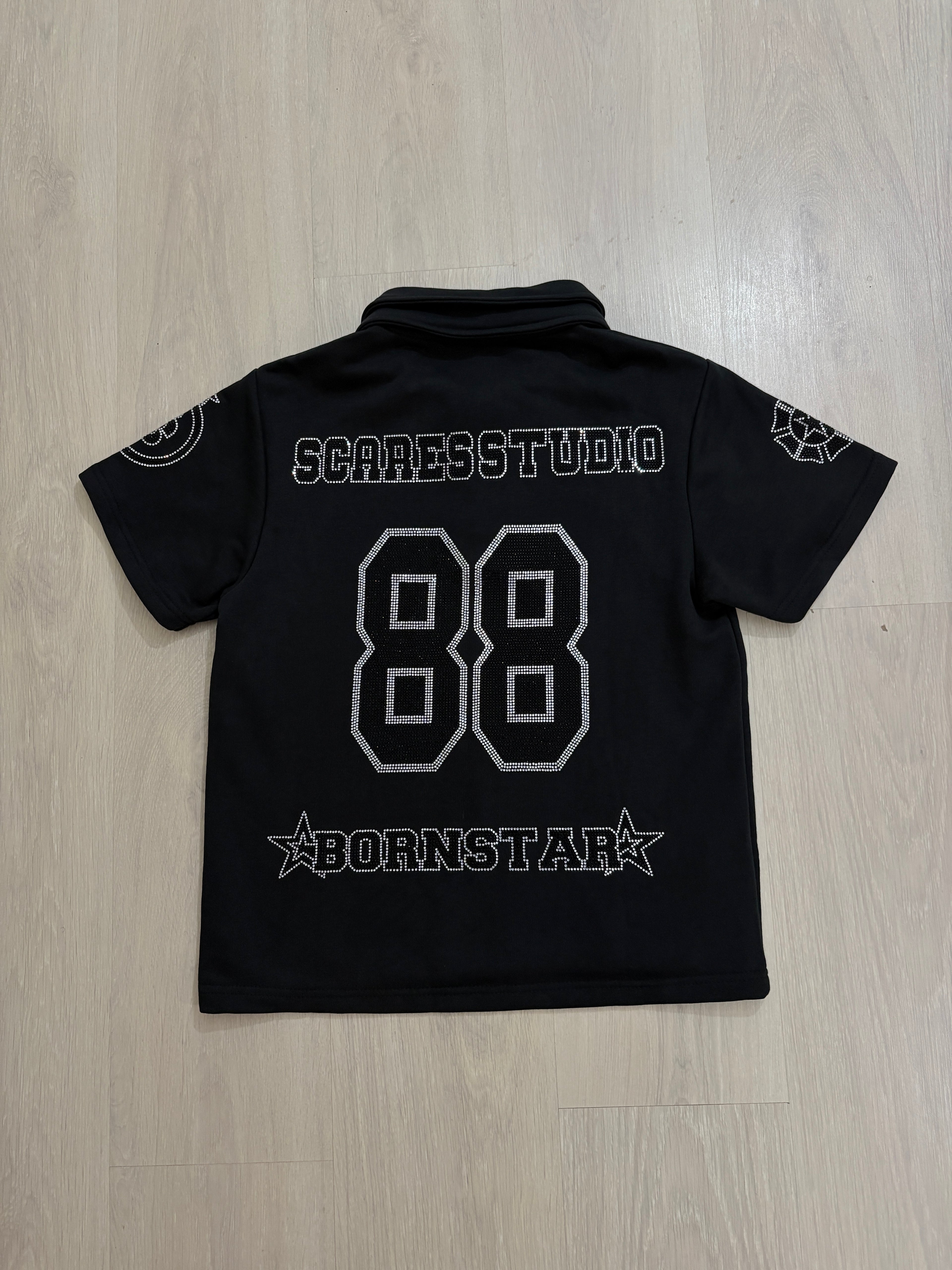 THE NEW BORNSTAR ROSE BLACK POLO SHIRT